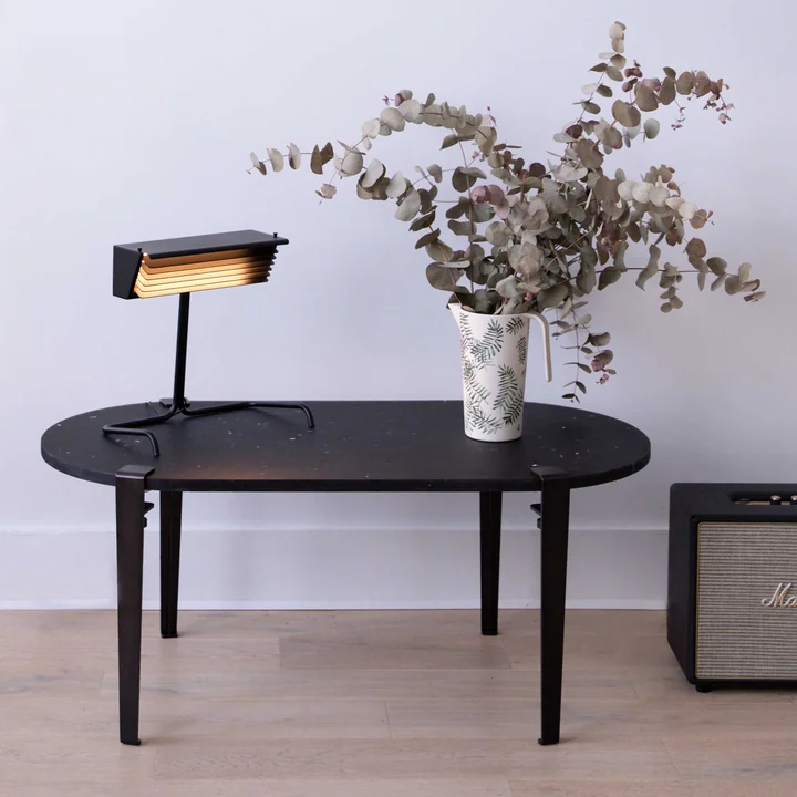 The GENOVA coffee table oval, graphite black from TipToe as a side table in the hallway