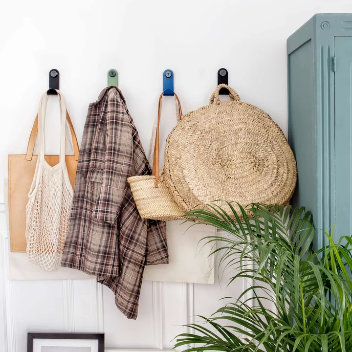 The JO wall hooks from TipToe as a colorful wardrobe in the hallway