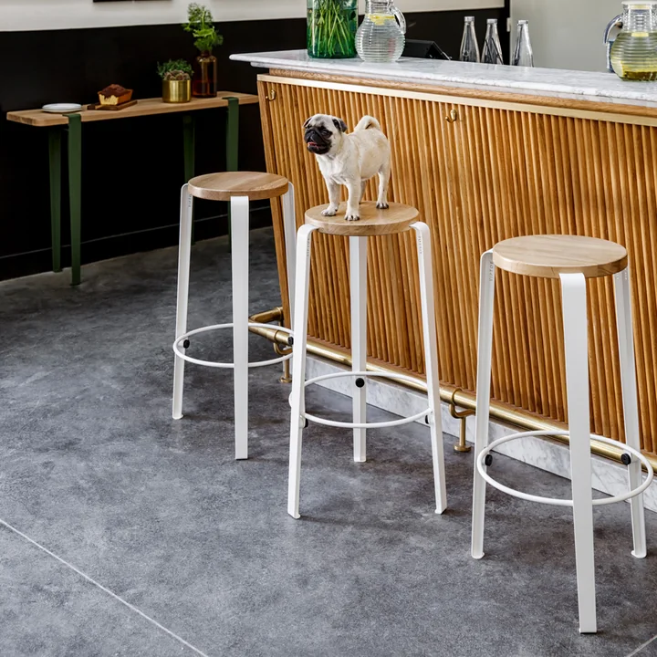 Lou bar stool by TipToe on a bar with wooden elements