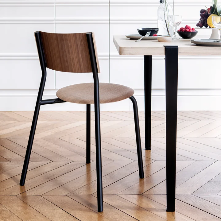 The SSD chair, walnut, graphite black by TipToe as an elegant chair in the dining room