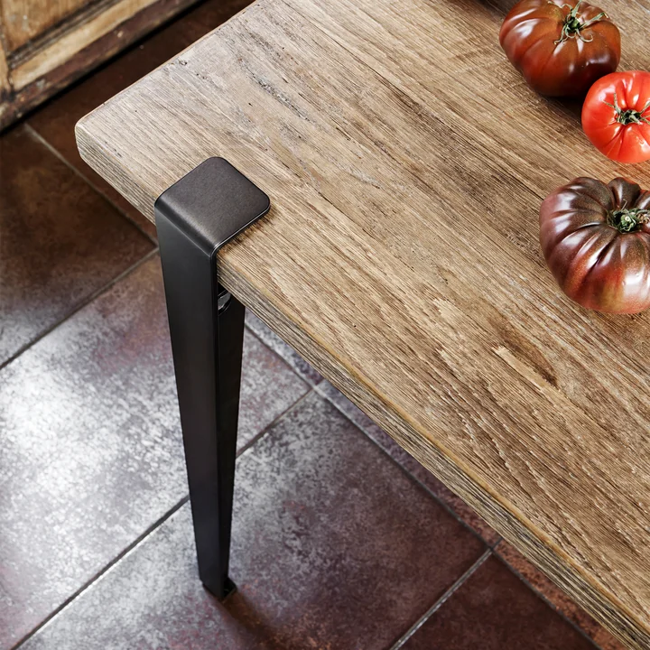 The table and desk leg, graphite black from TipToe on a rustic wood dining table