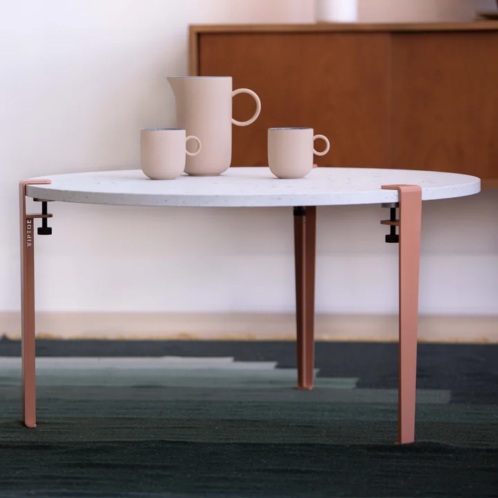 The Venezia coffee table from TipToe as a storage for cups and mugs in the dining room