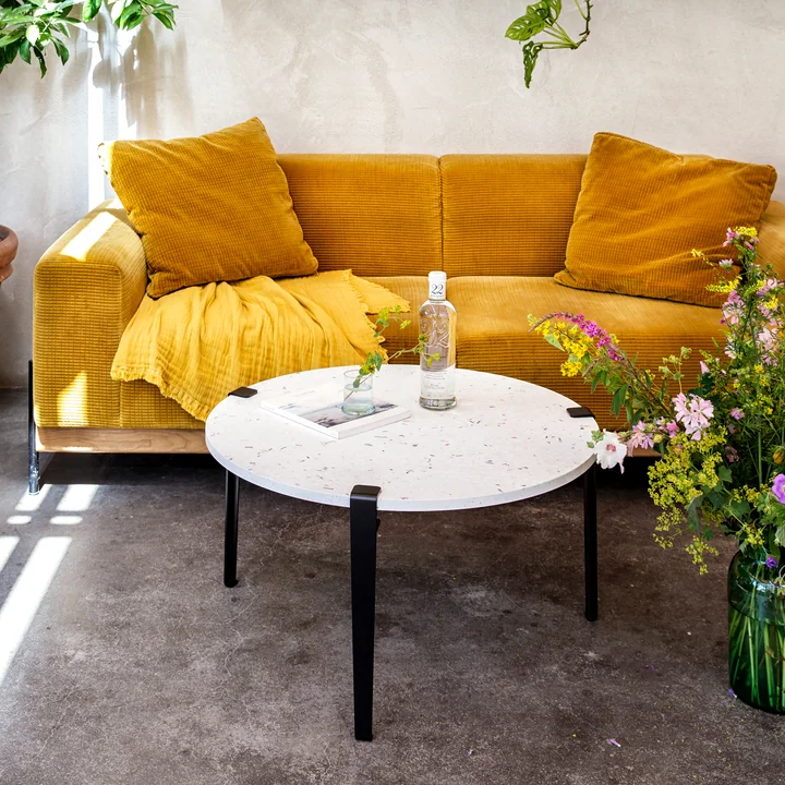 The Venezia coffee table from TipToe as an elegant accent in a colorful living room