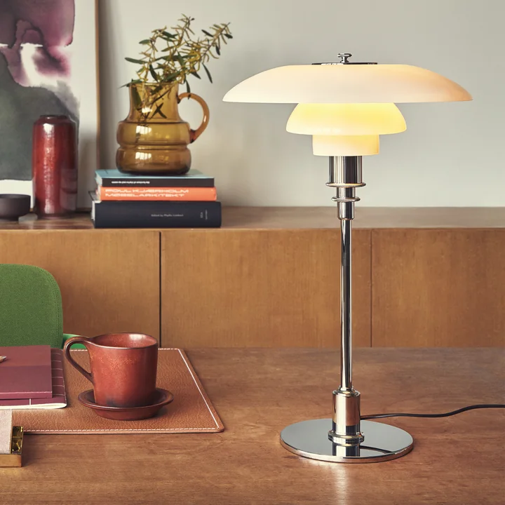 The PH table lamp, bright chrome from Lous Poulsen as desk lighting