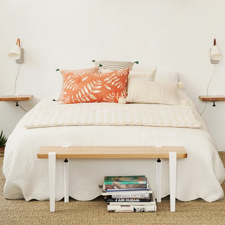 The DUKE bench oak, cloud white at the foot of a bed