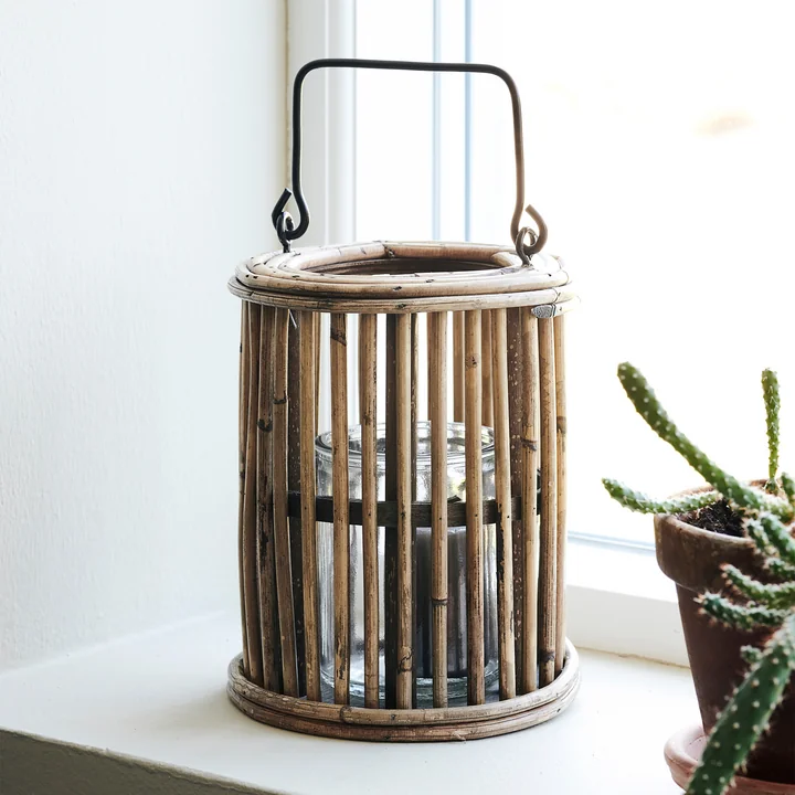 The Ova lantern, H 18 cm, natural by House Doctor on a windowsill