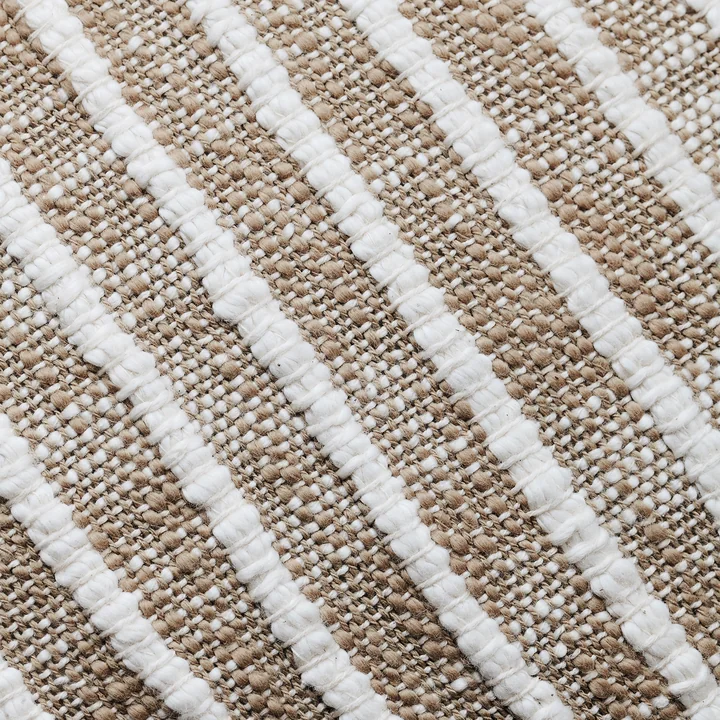 The Yarn pillowcase, light brown by House Doctor is characterized by a linear stripe pattern