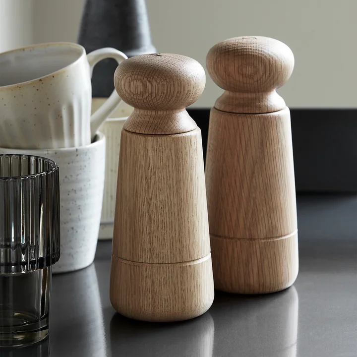 The Wardha salt and pepper mill (set of 2), oak by House Doctor on the worktop in the kitchen