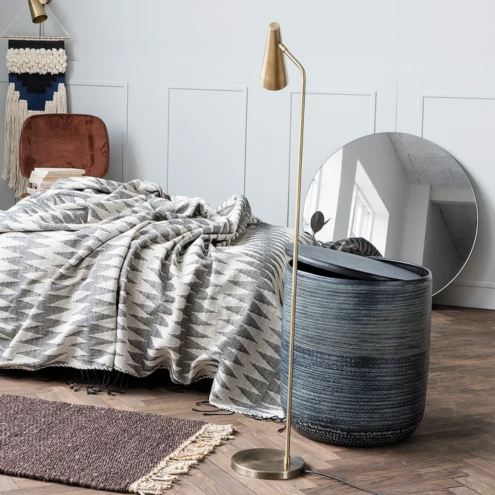 The floor lamp Precise, brass by House Doctor as lighting in the bedroom
