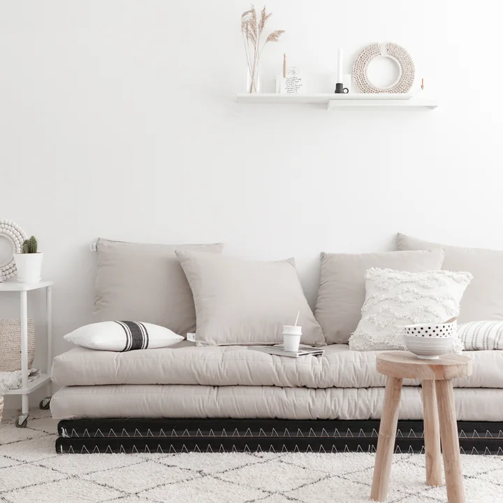 The Chico sofa bed from Karup Design in the brightly furnished living room