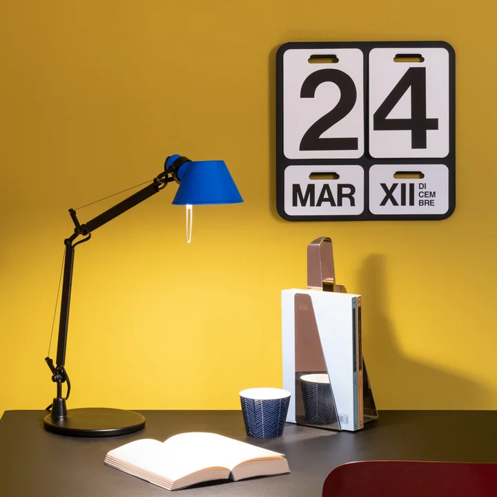 Tolomeo Micro Bicolor table lamp by Artemide on the desk