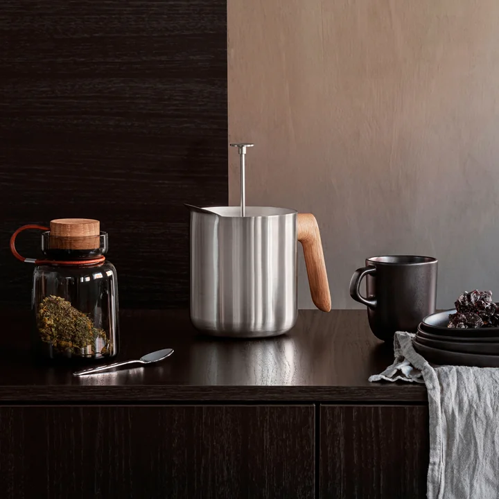The Nordic Kitchen tea maker by Eva Solo on a dark kitchenette
