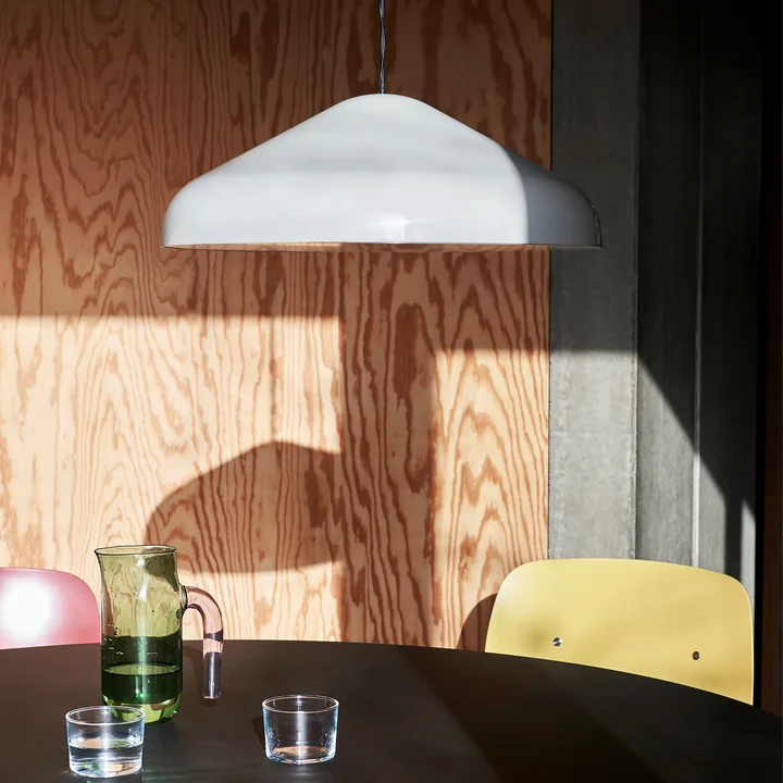 The Pao Steel pendant lamp, Ø 47 x H 16.25 cm, cream by HAY above a round dining table