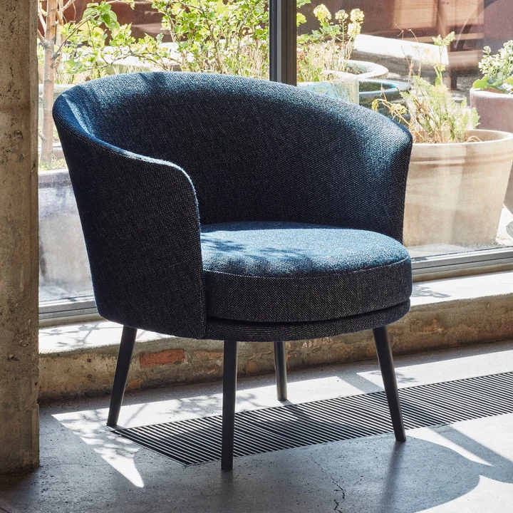 The Dorso armchair, powder-coated steel, fairway dark blue (308-288) by HAY front of the terrace