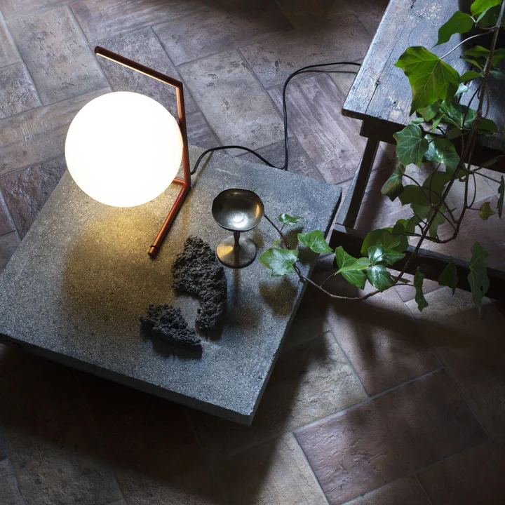 The IC table lamp from Flos in an atmospheric living room ambience