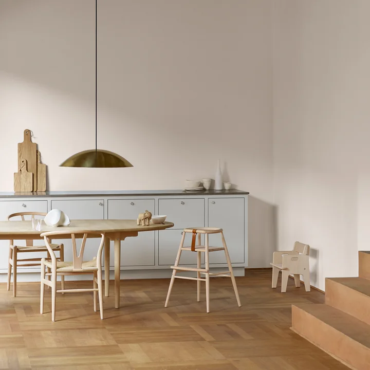 The ND54 high chair by Carl Hansen in the bright dining room
