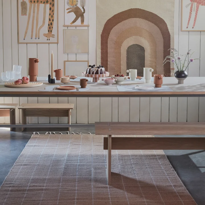 The Kotai bench and the Follow the Rainbow tapestry from OYOY in the dining room