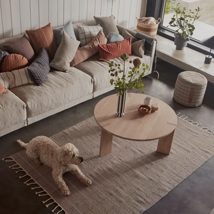 The Kyoto cushions on the couch and the OY coffee table in the living room.