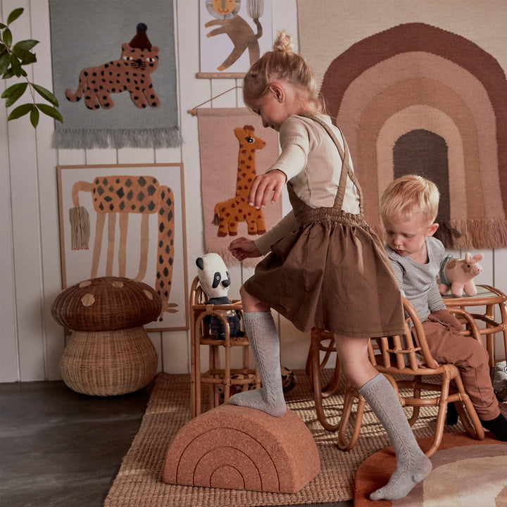 The Leopard Tapestry, the Mushroom Storage Basket and the Rainbow Balance Stool from OYOY in the children's room