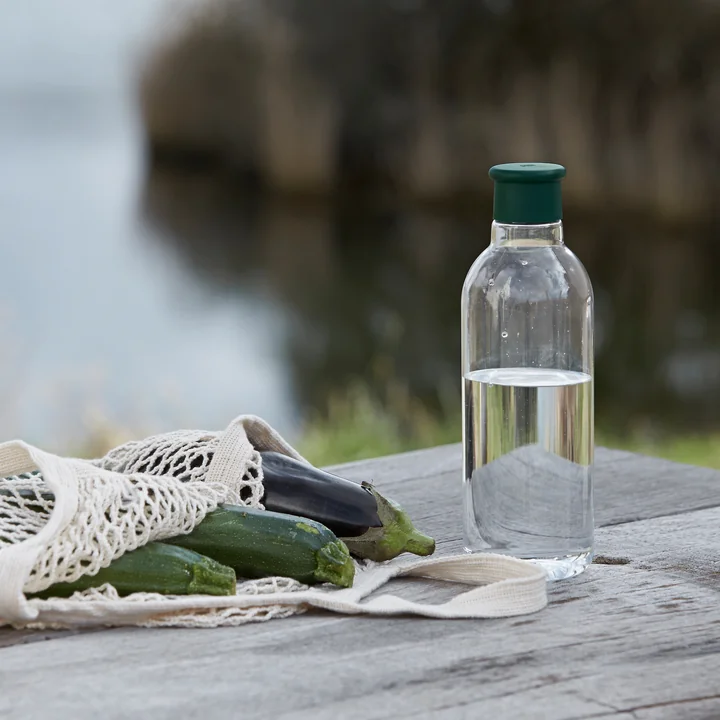 The Drink-It water bottle from Rig-Tig by Stelton on a wooden dock