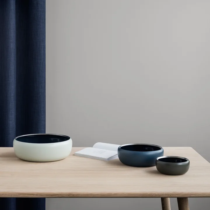 The Ora bowl of Stelton in its different versions on the table