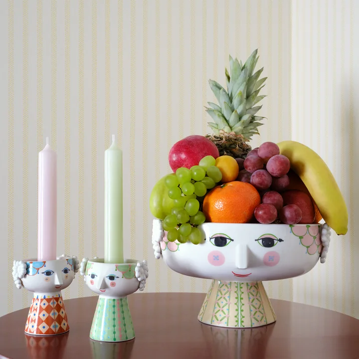 Eva Bowl and Eva candle holder from Bjørn Wiinblad on the side table
