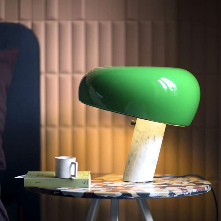 The Snoopy Table lamp from Flos on a side table