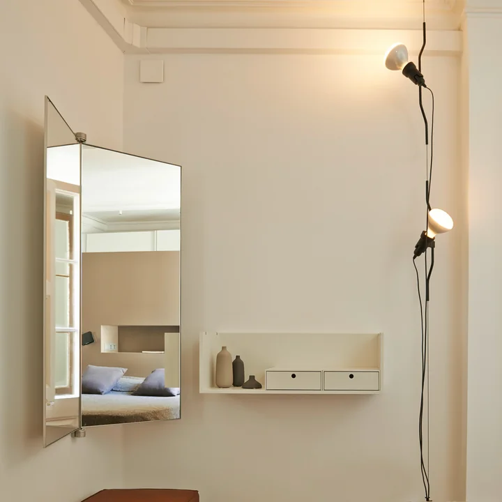 The Parentesi ceiling spotlight from Flos in the bedroom