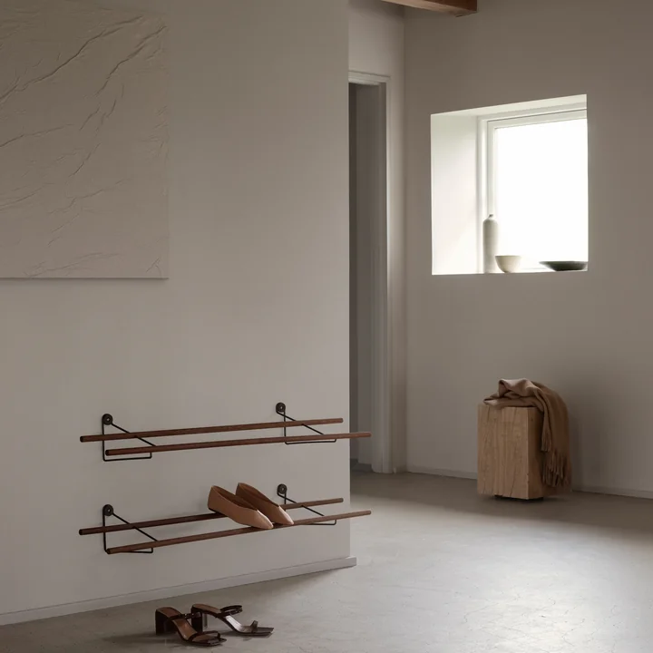 The Shoe Rack from We Do Wood with pumps and sandals in the wide hallway