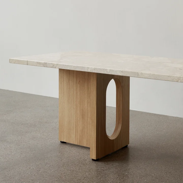 The Androgyne coffee table 120 x 45 cm, natural oak / Kunis Breccia sand from Audo impresses with its artistic design language