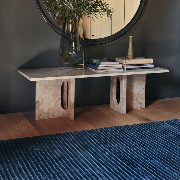 The Houkime rug, Midnight blue next to the Androgyne Lounge Table by Audo