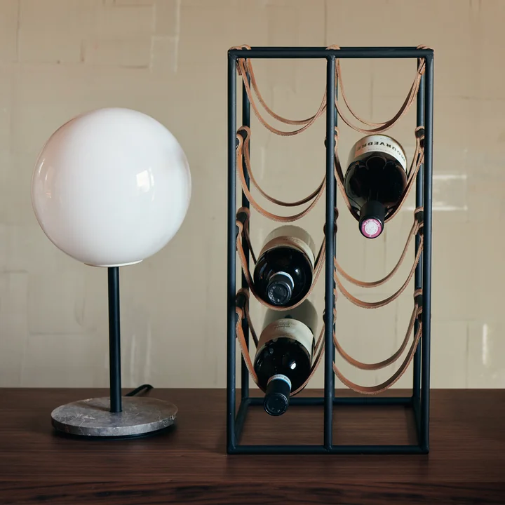 The Umanoff wine rack for 8 bottles, steel black (RAL 9005) / leather brown from Audo in industrial design