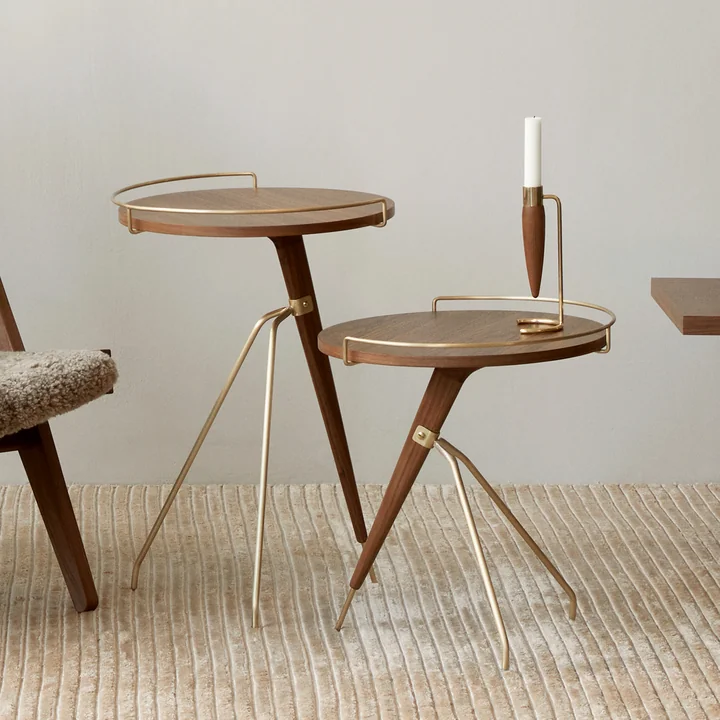 The Umanoff candlestick, brass / walnut on the Umanoff side table by Audo