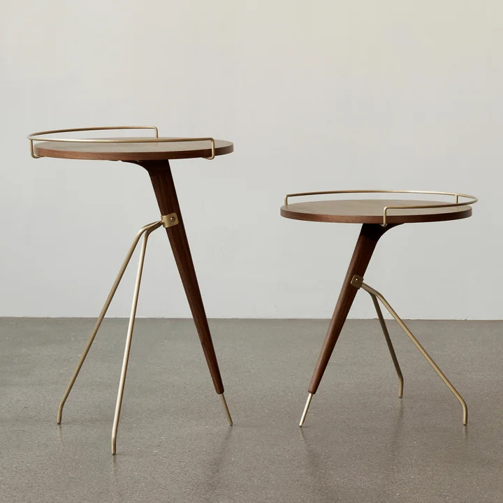 The Umanoff side table, walnut / brass from Audo in its various sizes.