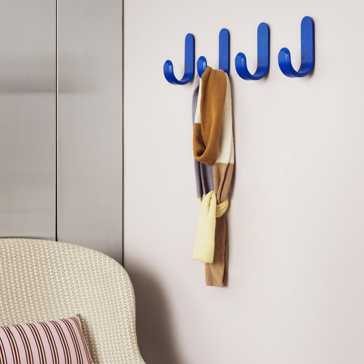 The blue Curve Wall hook from Normann Copenhagen can be used to hang scarves