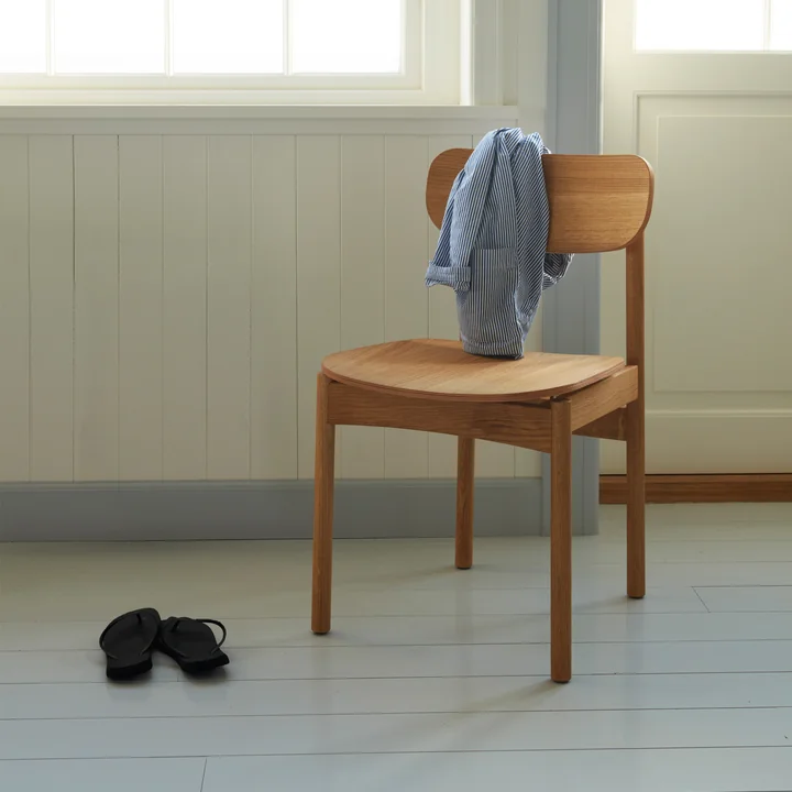 The Vester Chair from Skagerak also serves to hang bags or clothes