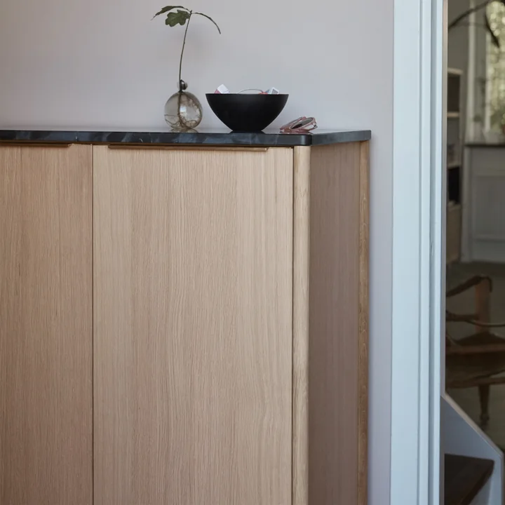 The Jut High Cabinet from Skagerak as a chest of drawers and storage for decoration and everyday objects