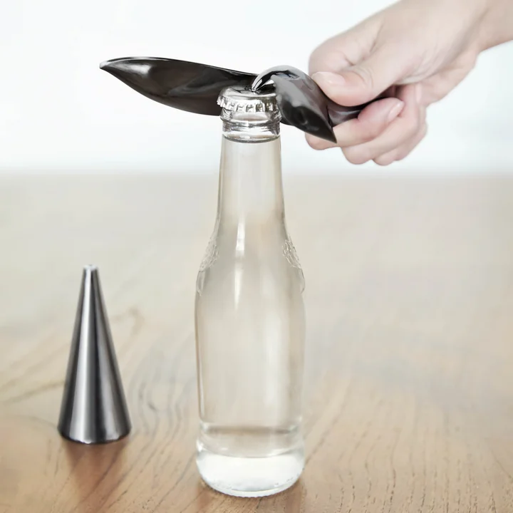 The Tipsy bottle opener from Umbra when opening a glass bottle