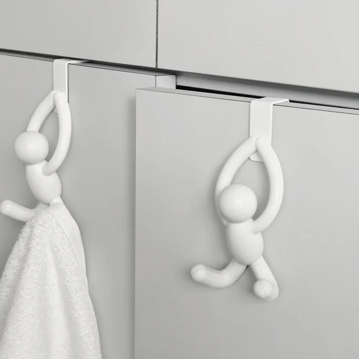 The Buddy door hooks from Umbra on white cabinet doors