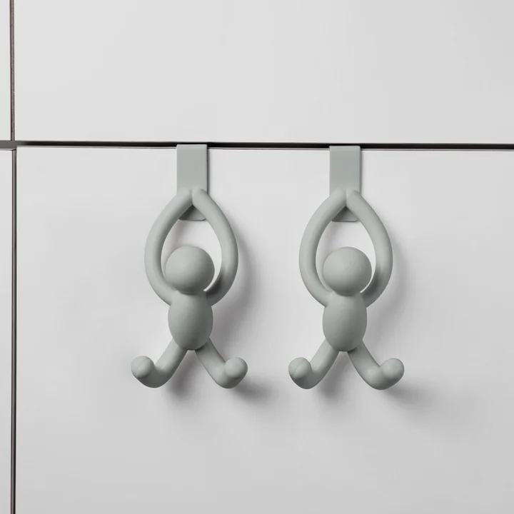 The Buddy door hooks from Umbra on a cabinet door