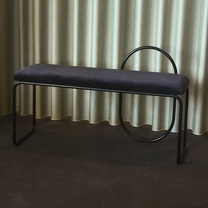 The Angui bench from AYTM with a black cotton velvet seat