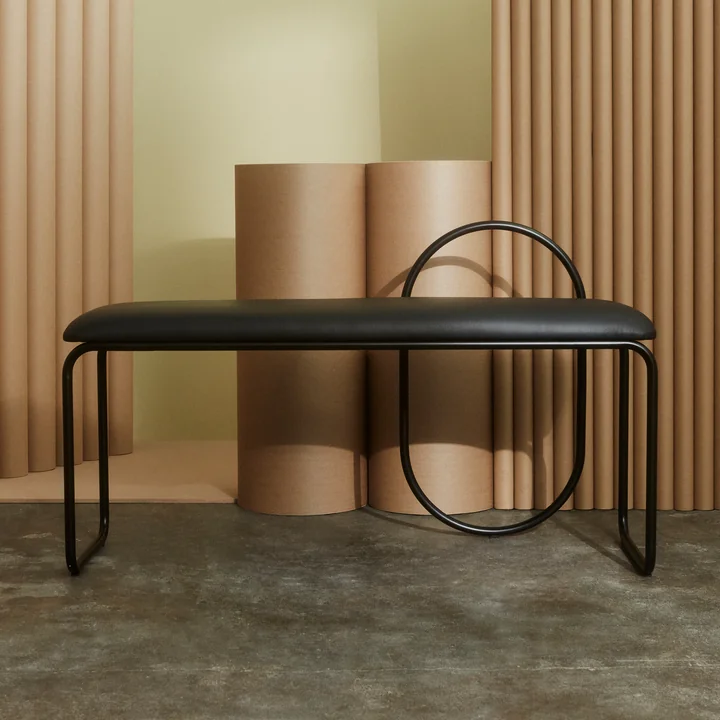 The Angui bench from AYTM with a black leather seat