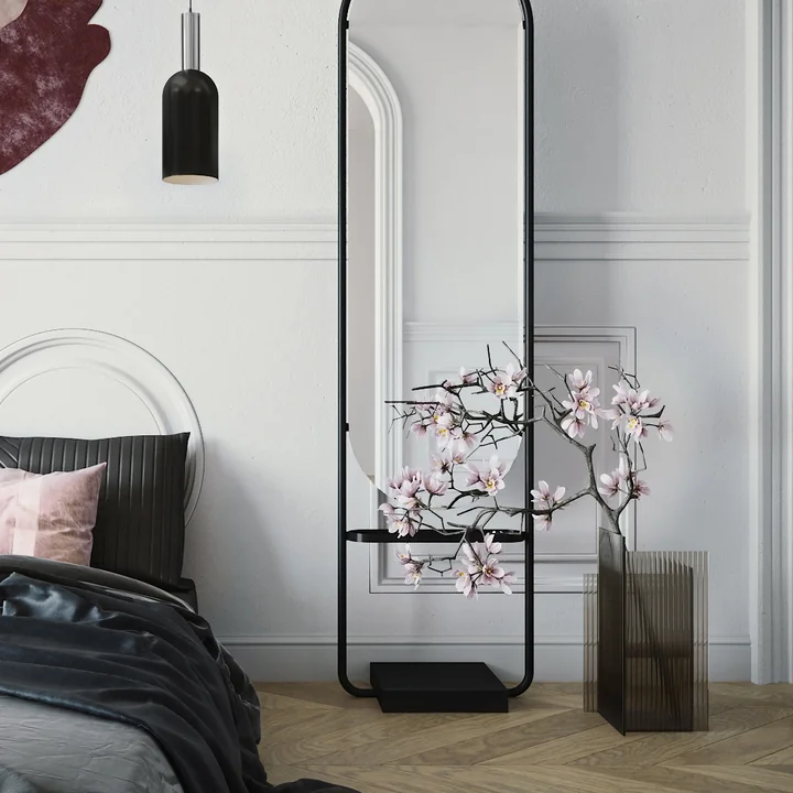 The Flos vase from AYTM in the bedroom next to the floor mirror