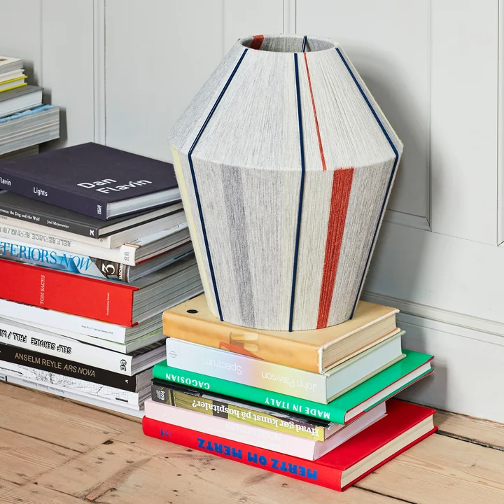 The Bonbon lampshade from HAY on a colourful stack of books