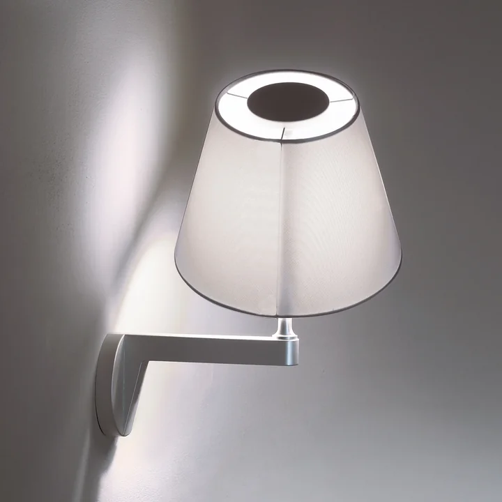 The Melampo Parete Wall light from Artemide consists of high quality materials