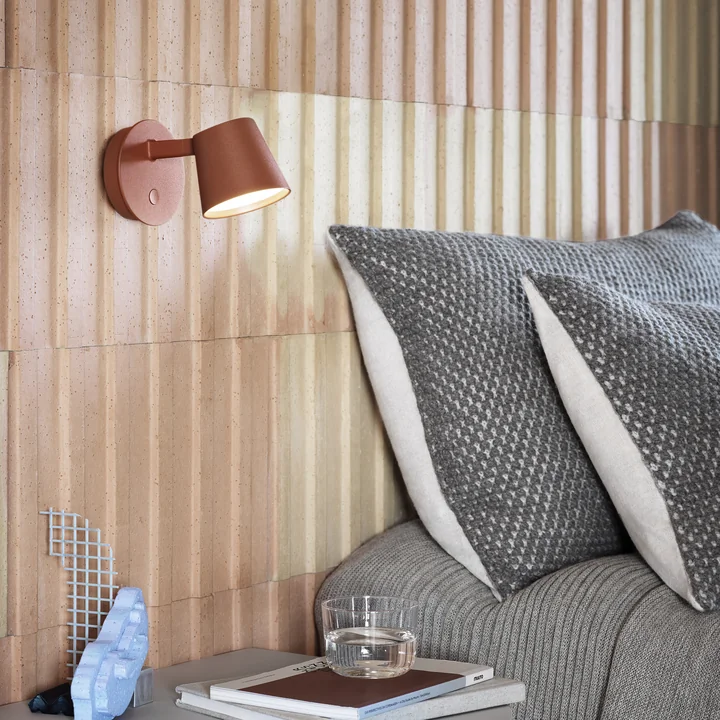 The Tip wall light from Muuto as a night light above the bed