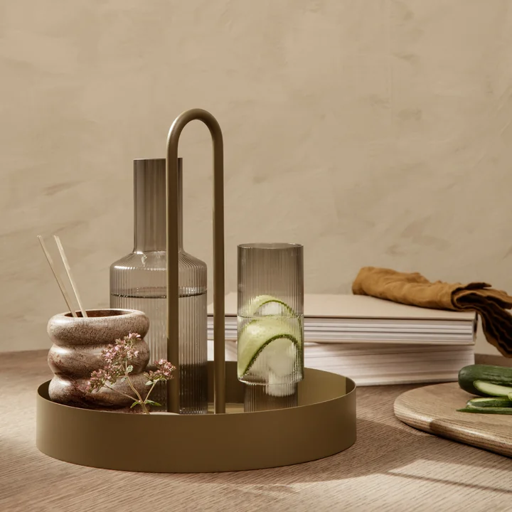 The Grib tray from Ferm Living with water glasses and decorative objects