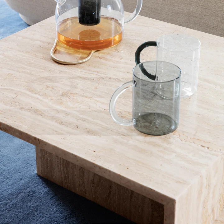 The Still Cup by Ferm Living with teapot on a stone table