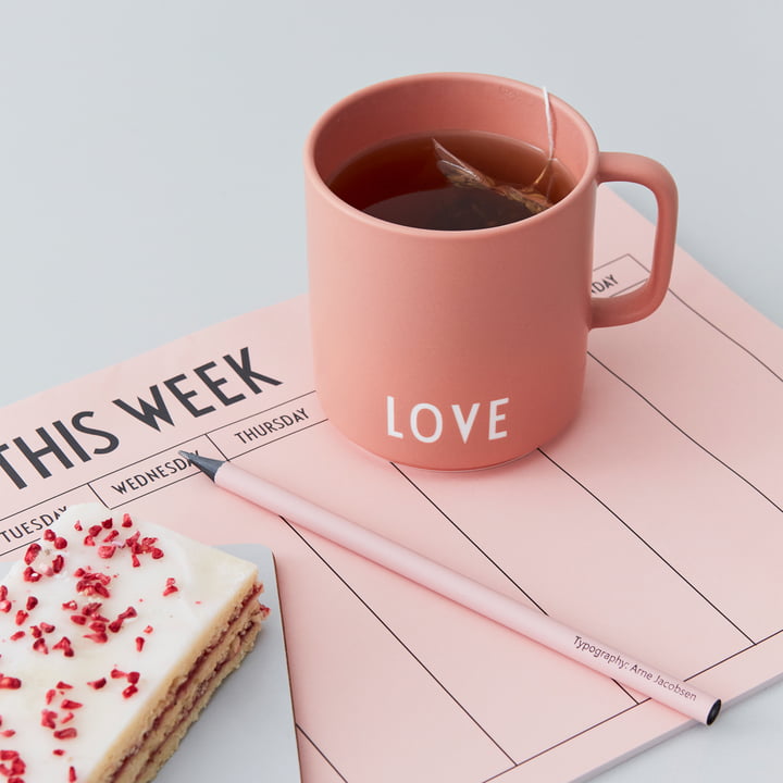 The AJ Favourite porcelain mug from Design Letters in Love / nude on a pink calendar