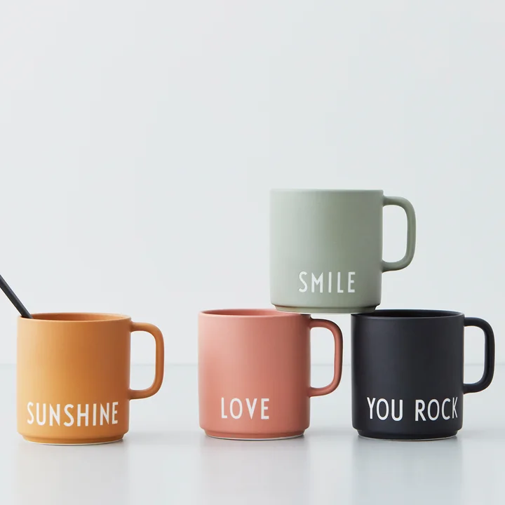 The AJ Favourite porcelain mugs from Design Letters in their different colors